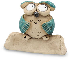 Owl on perch turquoise